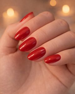 Valentine Nails in glossy classic red, short almond shape, clean cuticles, Top Nails 3