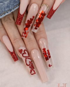 Valentine Nails black glitter manicure with pink heart negative space design, glossy almond shape, Top Nails 3