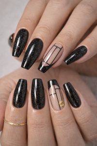 Glossy black glitter coffin nails with nude negative space accents, minimalist black geometric line art, and a tiny yellow flower detail, Nail Trends 2026 at Top Nails 3 Airdrie