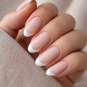 French tip mix texture nails with matte nude and glossy white tips at Top Nails 3 Airdrie